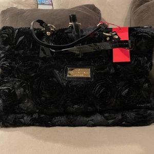 New with tags Valentino black "Rosette" handbag